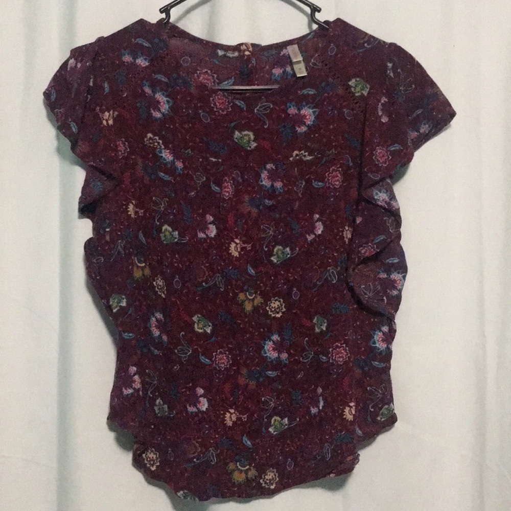 A floral blouse. Offers are always welcome